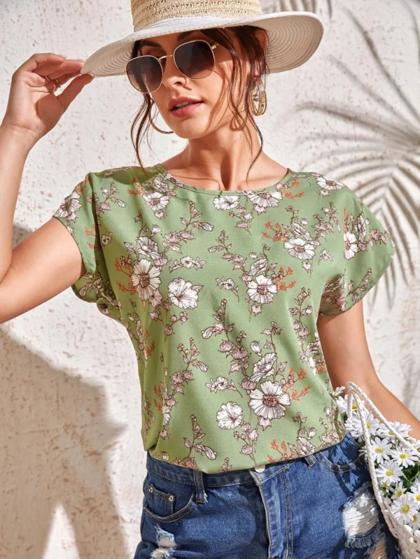Blusa con estampado floral de manga murciélago
