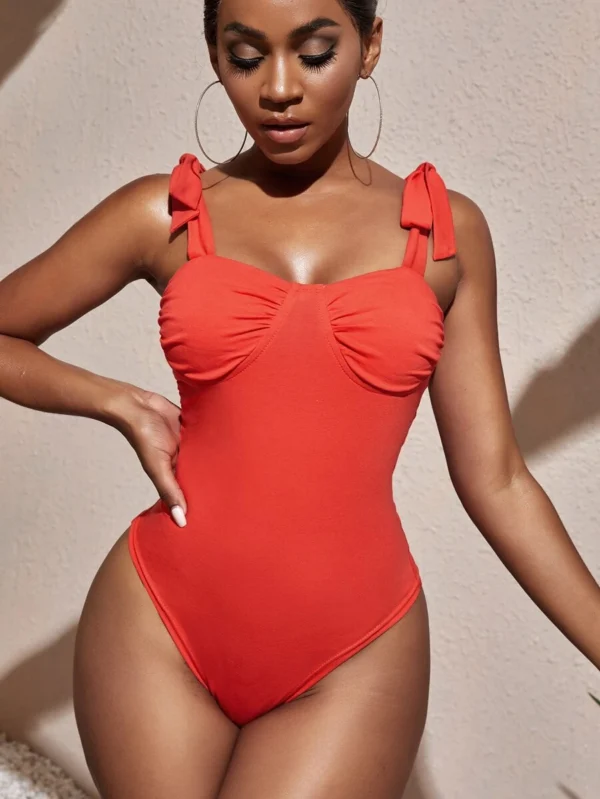 SXY Body de hombros con nudo unicolor