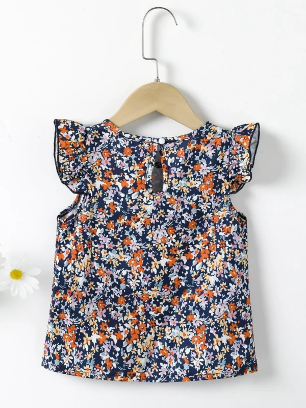 Blusa floral de manga con volante de espalda con abertura de ojo