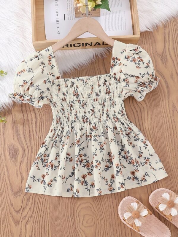 Blusa de flores para niña preadolescente con mangas abullonadas