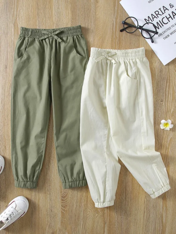 Pantalones unicolor con lazo delantero