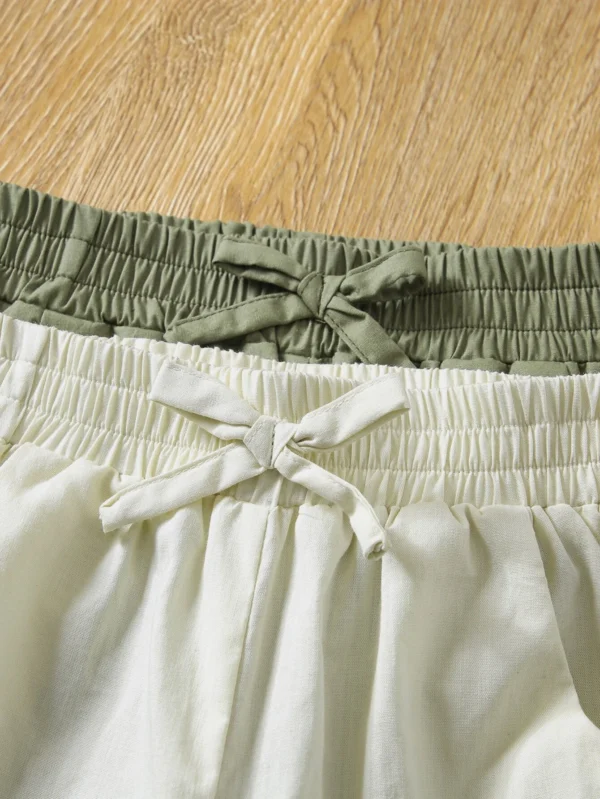 Pantalones unicolor con lazo delantero - Imagen 4