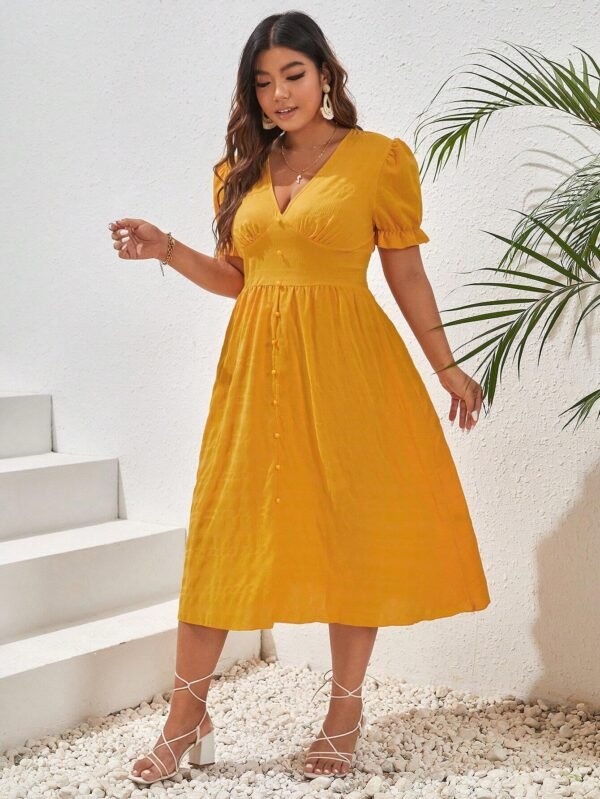 Vestido de manga farol con botón delantero