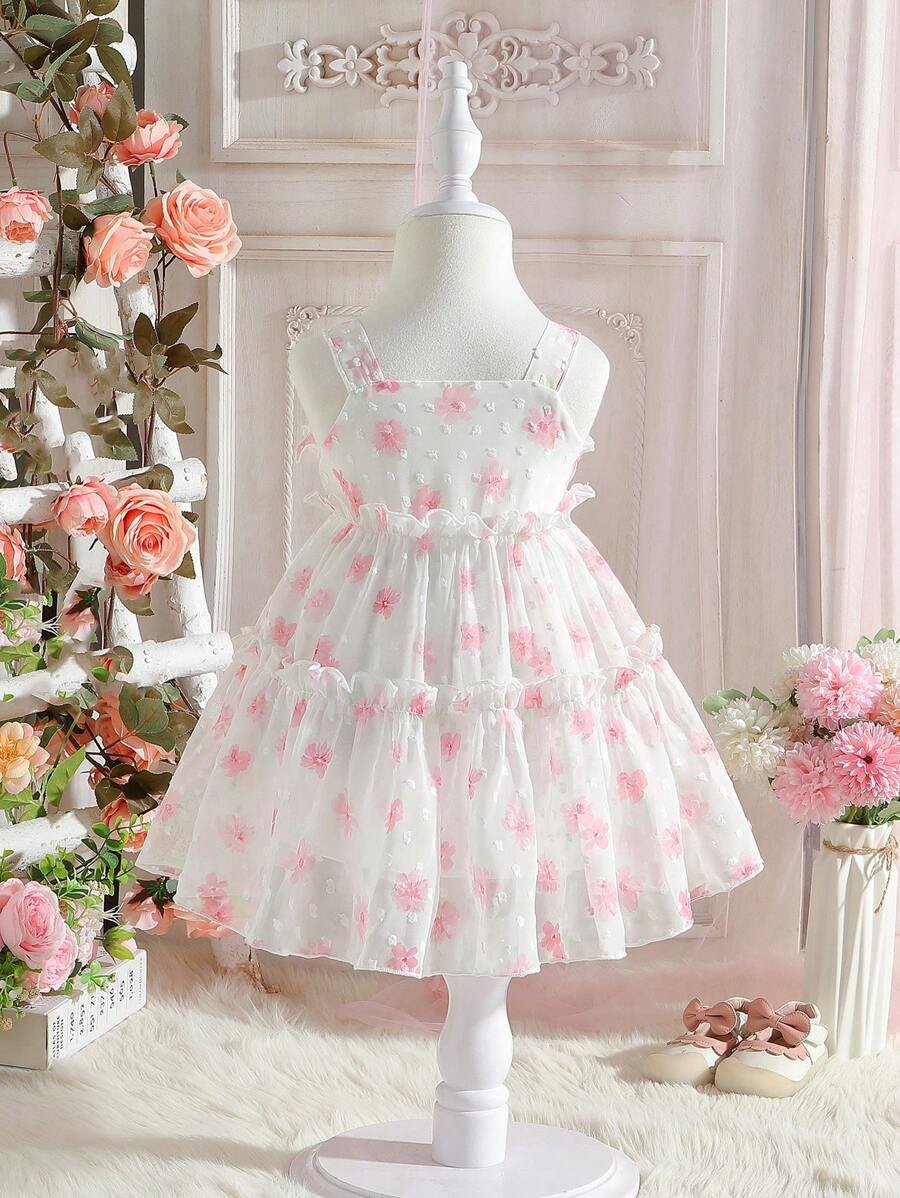 Lindo vestido para bebé niña con detalles de lazo y diseño de flores ideal para uso al aire libre en verano - Imagen 3