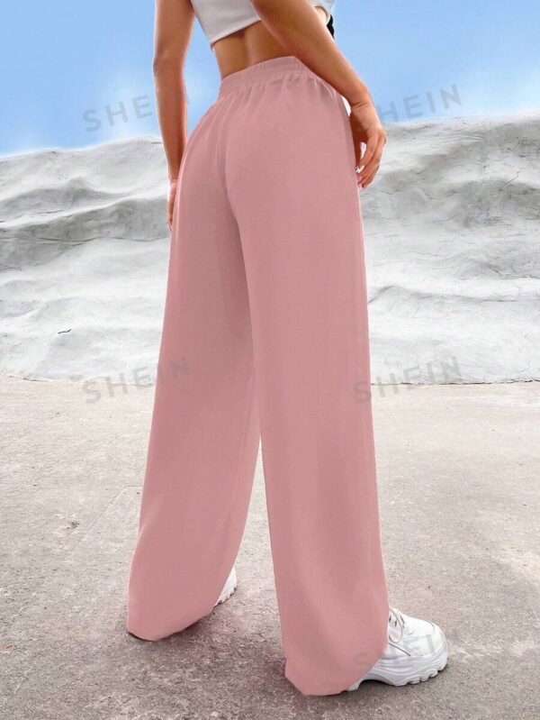 Pantalones unicolor de talle alto - Imagen 2