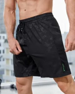 Pantalones cortos deportivos con gráficos de letras