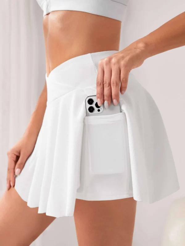 Skort deportivo de cintura ancha con bolsillo para teléfono