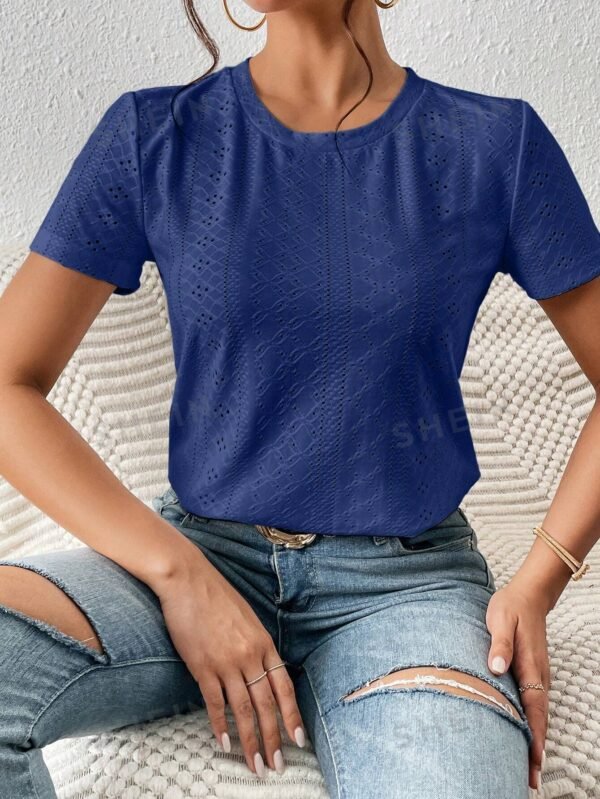 Blusa con cuello redondo y bordado de ojales - Imagen 2