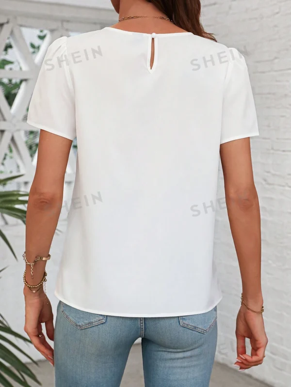 Blusa de cuello redondo con mangas cortas y estampado floral - Imagen 3