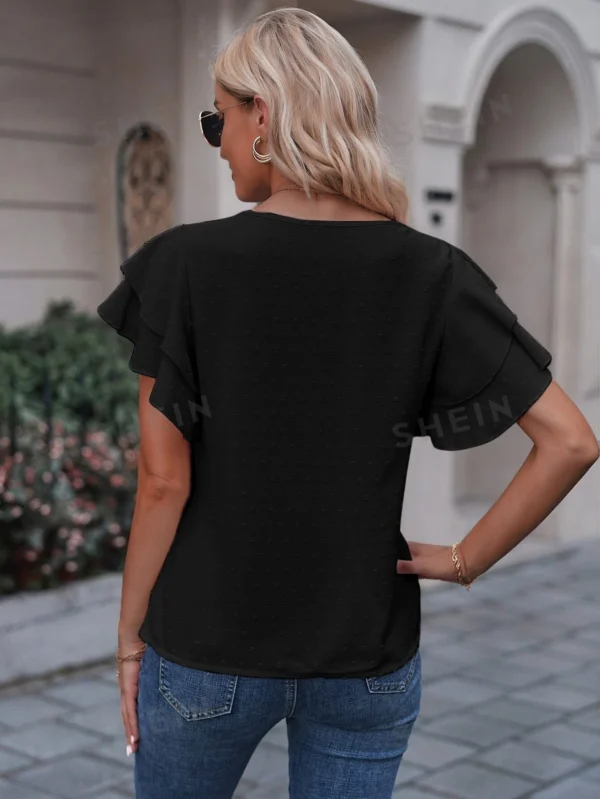Blusa de lunares de manga mariposa - Imagen 3