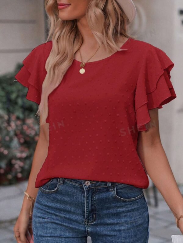 Blusa de lunares de manga mariposas