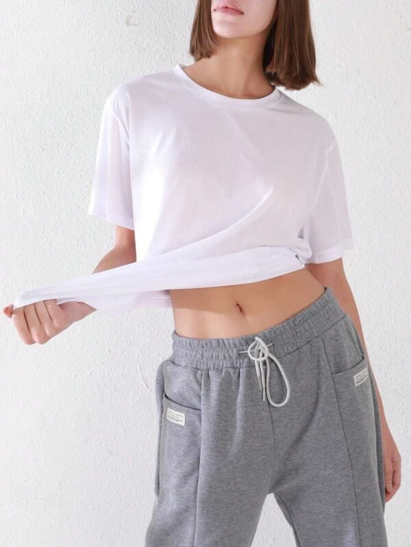 Camiseta deportiva básica para mujer de unicolor blanco, ultraligera - Imagen 3
