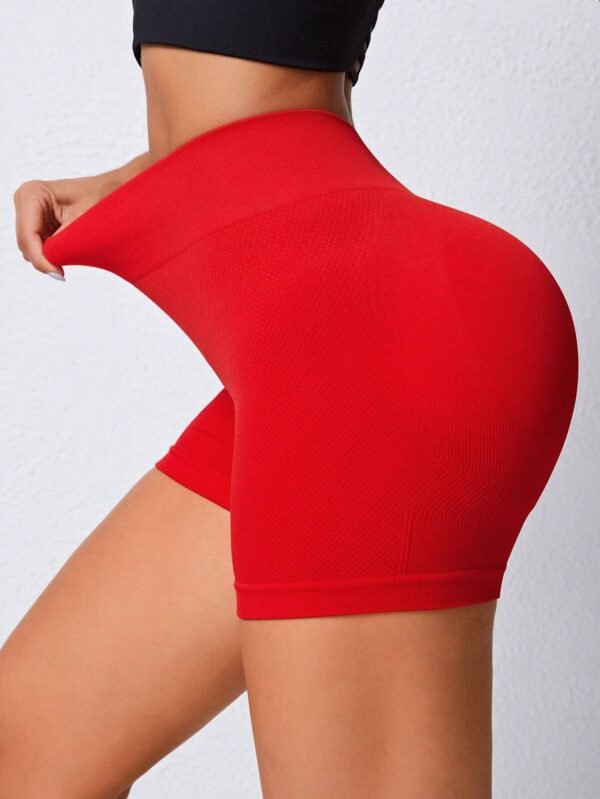 Shorts deportivos unicolor de cintura ancha
