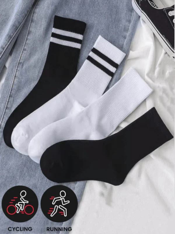 4 pares de calcetines deportivos sólidos en blanco y negro