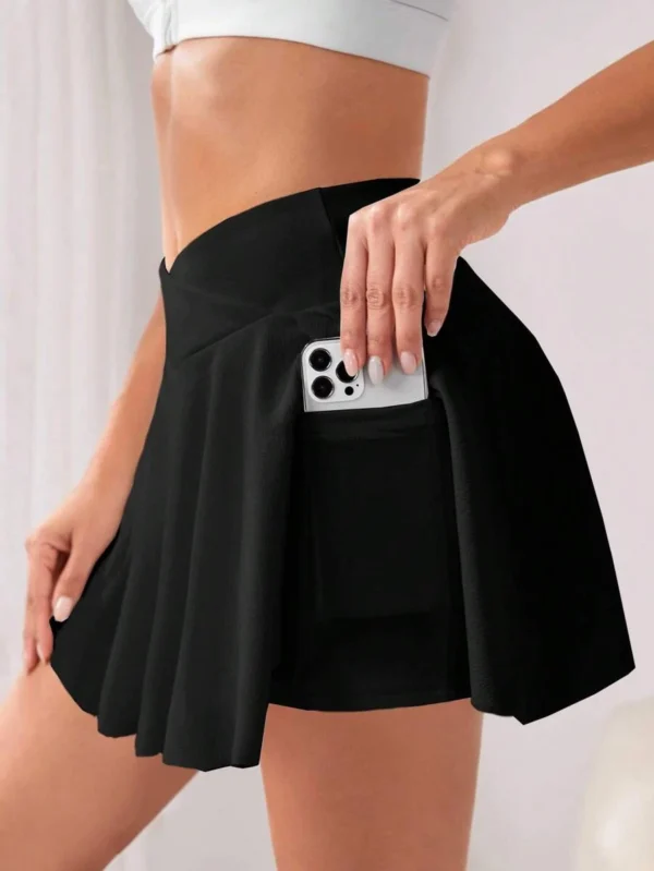 Falda pantalón deportiva de cintura alta sólida con bolsillo para teléfono