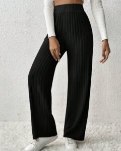 Pantalones de tela de grano holgada con cintura elástica