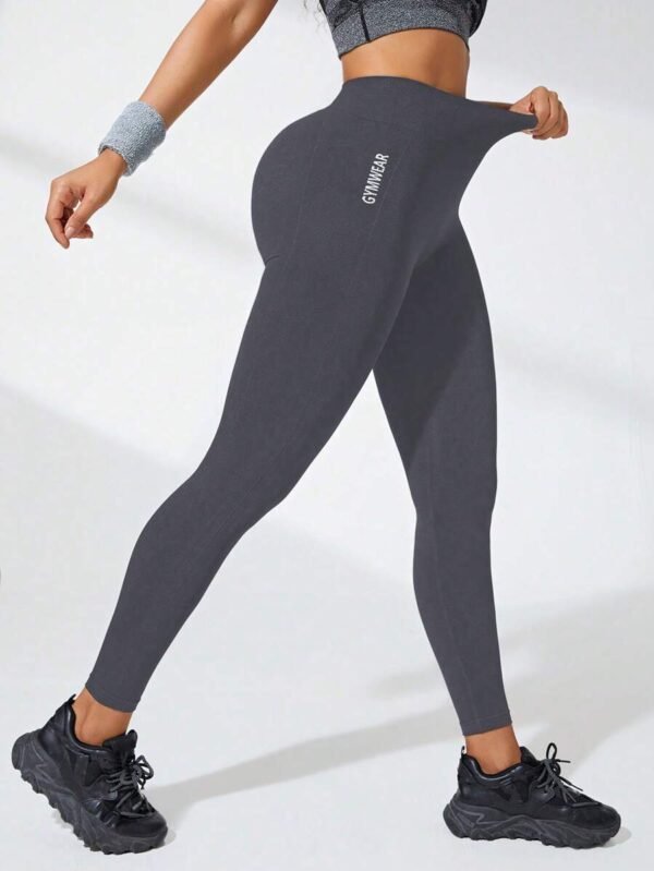 Leggings sin costuras con gráfico de letra - Imagen 3
