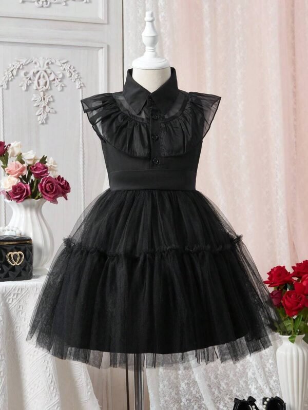 Vestido negro con cuello de malla para niña