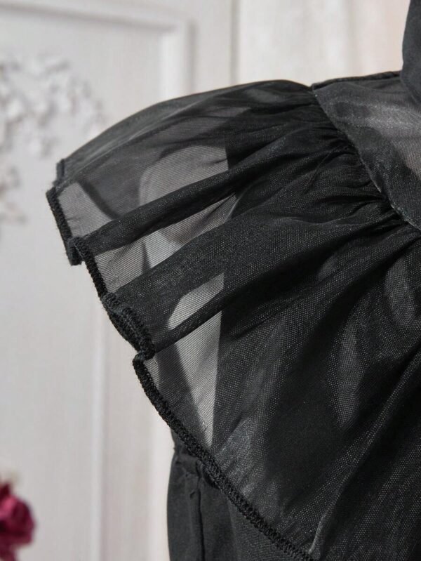 Vestido negro con cuello de malla para niña - Imagen 2
