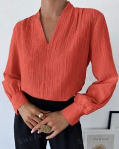 Blusa suelta de manga larga con cuello en V