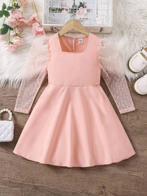 Vestido de niña de manga abullonada transparente