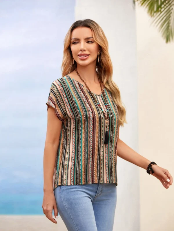 Blusa de manga de murciélago con estampado de rayas