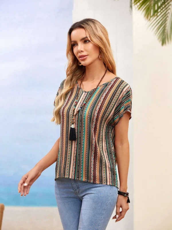 Blusa de manga de murciélago con estampado de rayas - Imagen 3