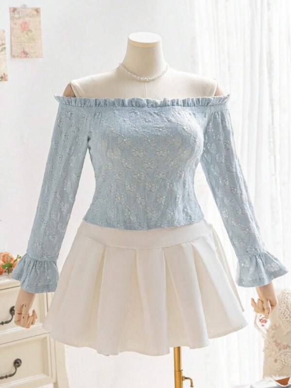 Blusa de manga farol con estampado de leopardo y nudo al frente