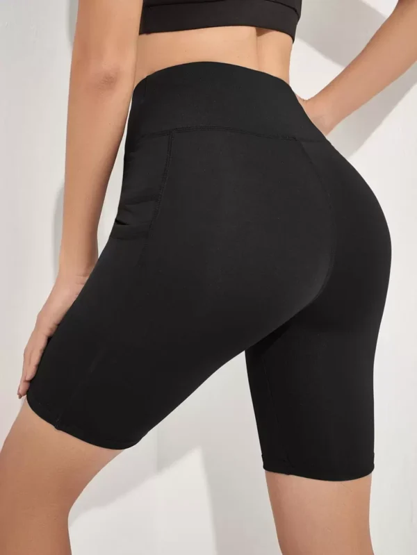 Shorts elásticos sólidos con bolsillo para teléfono para ciclista - Imagen 3