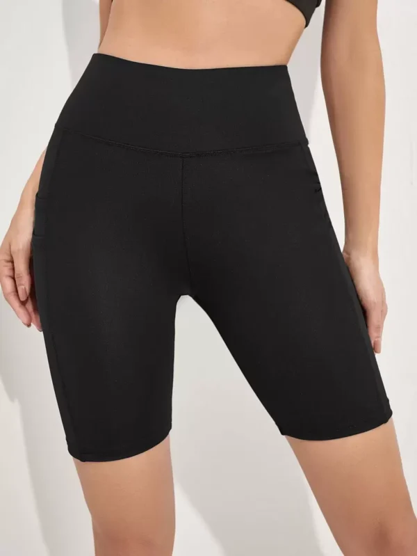 Shorts elásticos sólidos con bolsillo para teléfono para ciclista - Imagen 2