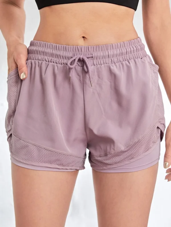 Pantalones cortos deportivos con cintura de cordón y bolsillo para teléfono