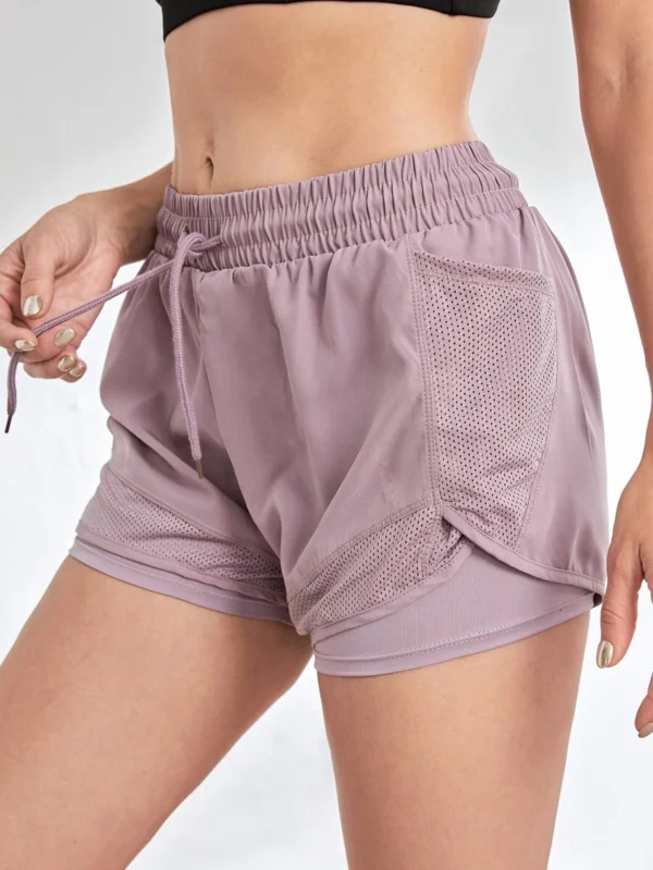 Pantalones cortos deportivos con cintura de cordón y bolsillo para teléfono - Imagen 2