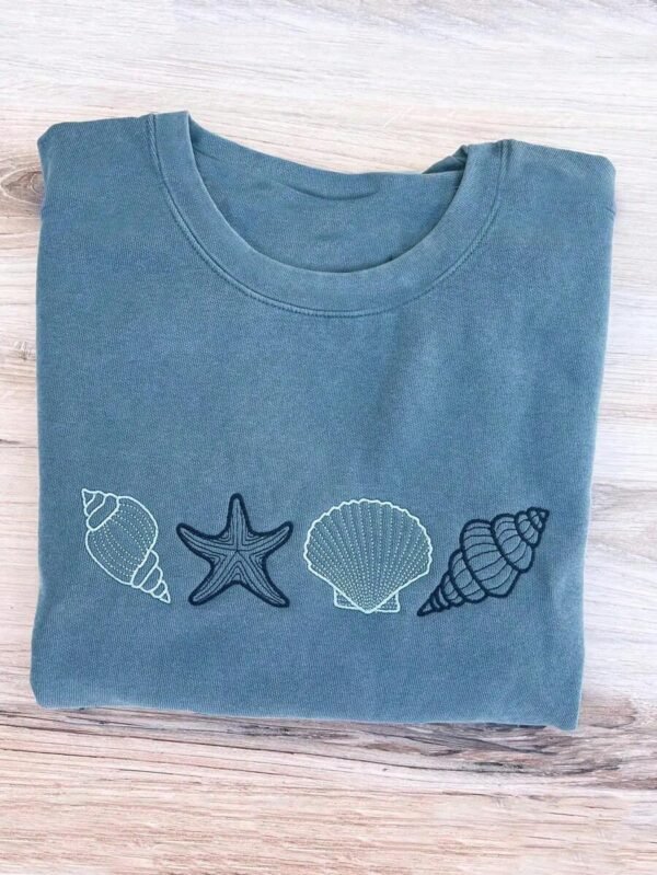 Camiseta de cuello redondo con gráfico oceánico