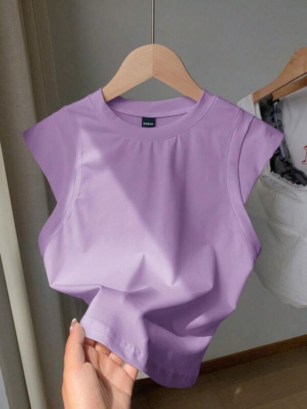 Camiseta casual de cuello redondo y hombros caídos de color liso para mujer