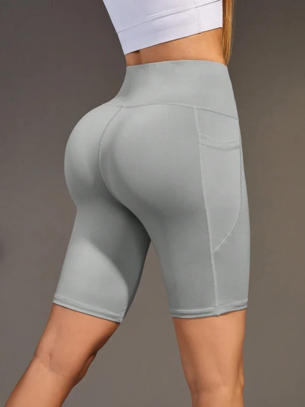 Pantalones cortos deportivos sin costuras con bolsillo para el gimnasio - Imagen 3
