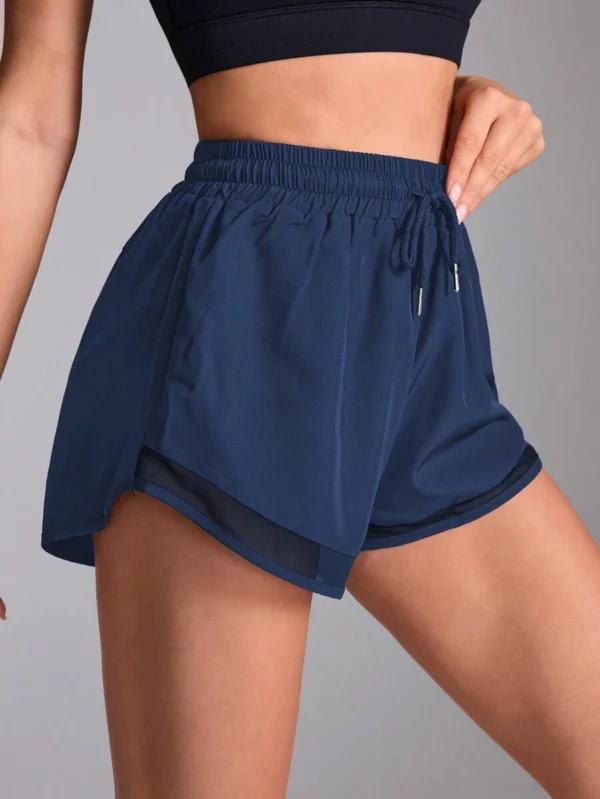 Pantalones cortos deportivos para mujer con contraste de malla - Imagen 2