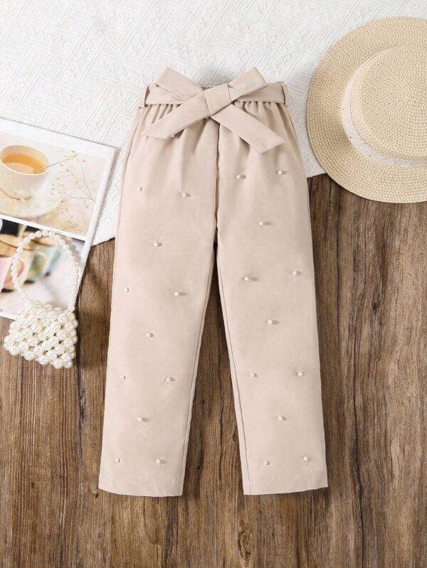 Pantalones largos informales para niña con adornos