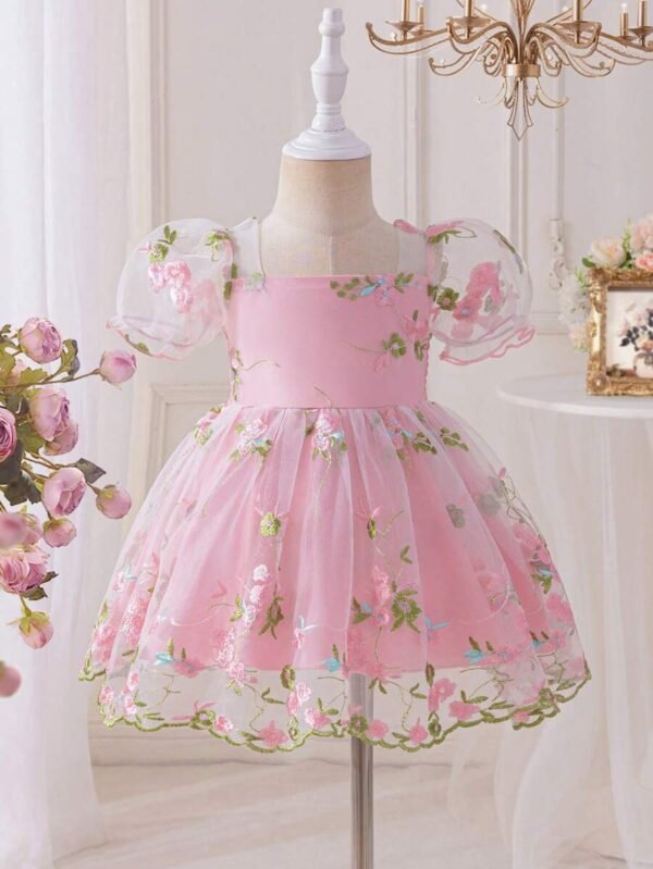 Vestido rosa de manga abullonada y malla para niña bebé