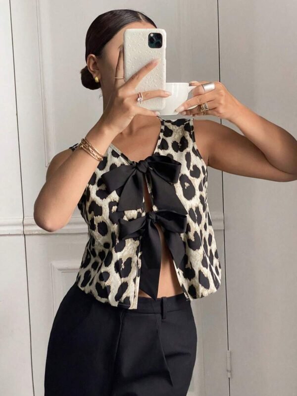 Blusa casual sin mangas con nudo delantero y estampado de leopardo para mujer