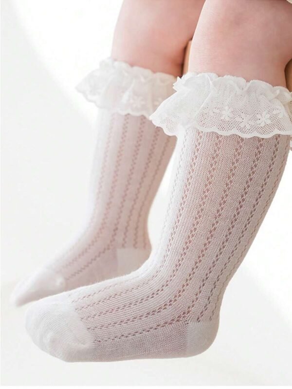 1 par de calcetines largos de malla con volantes para bebé/niña
