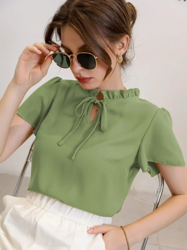 Blusa de cuello con corbata y mangas abullonadas