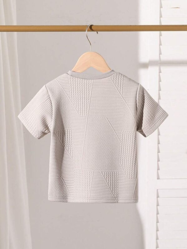 Camiseta de niño de manga corta y cuello redondo de color liso - Imagen 3