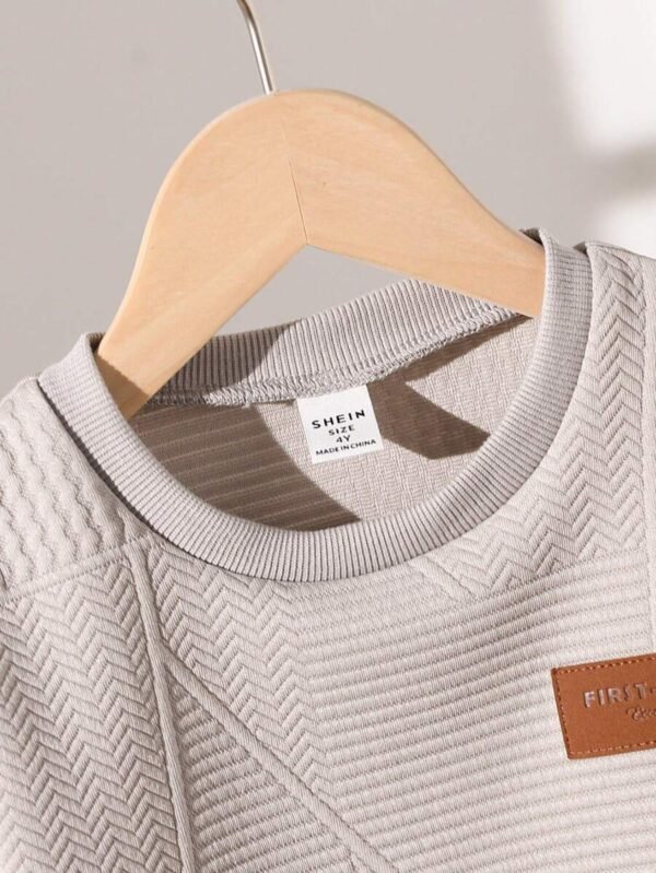 Camiseta de niño de manga corta y cuello redondo de color liso - Imagen 2