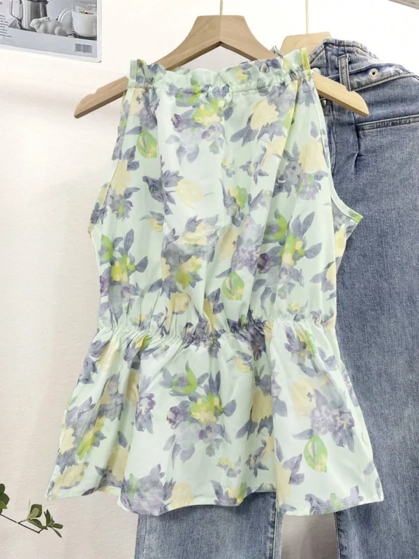 Top sin mangas de mujer con estampado floral y volante