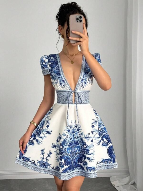 Vestido elegante con cuello en V y estampado floral con lazo