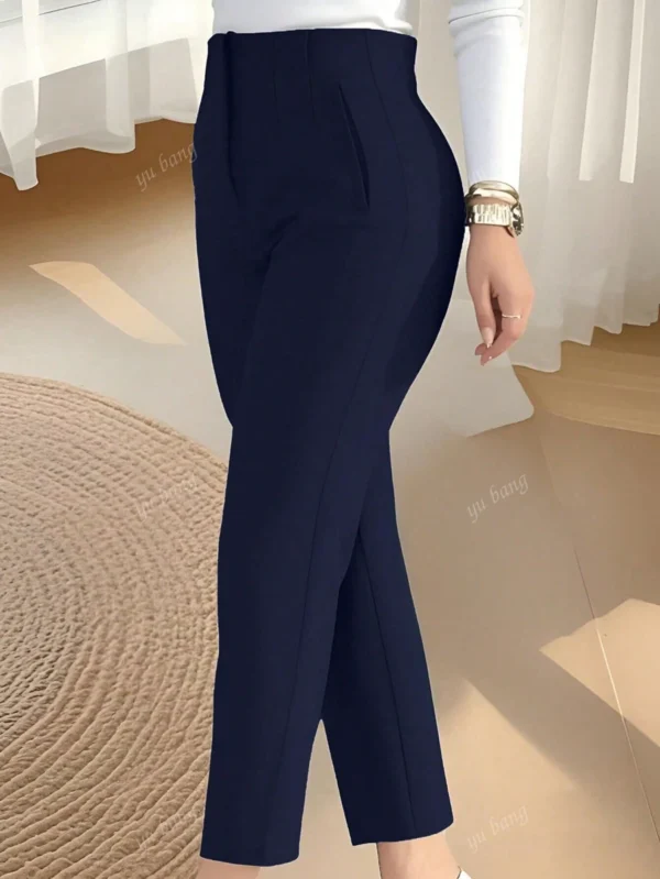 Pantalones de tiro alto y ajustados de unicolor