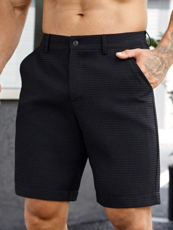 Shorts unicolor con bolsillo oblicuo