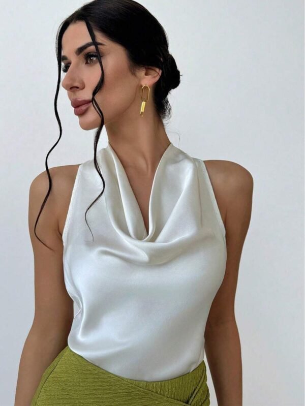 Blusa de mujer con cuello de lazo en color albaricoque