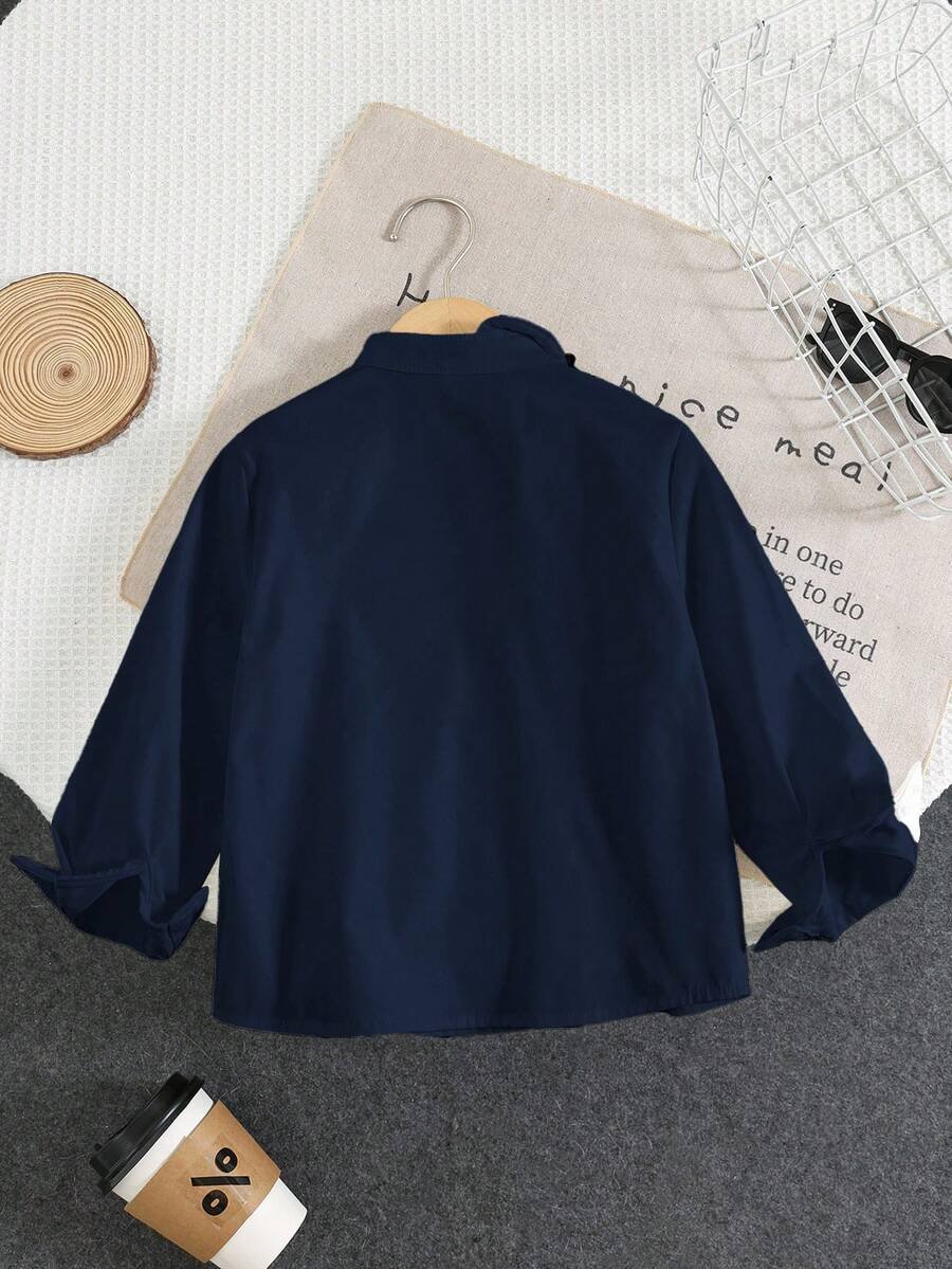 Camisa de manga larga con cuello vuelto y botones en diagonal - Imagen 3