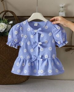 Blusa de manga abullonada con lazo y estampado de margaritas